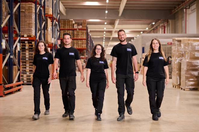 Colleagues in JYSK Distribution Centre Cheste walking towards the camera